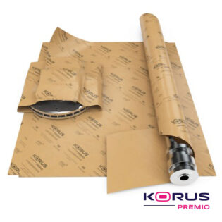2 peças metálicas a serem embrulhadas pelo papel korus premio, sobre folhas abertas desse papel.